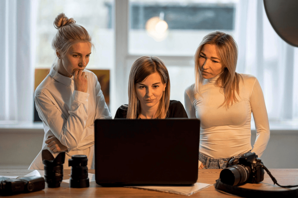 Photographer working at laptop